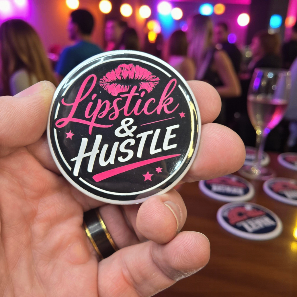 Lipstick and Hustle Pocket Mirror held in hand at a party with bold pink and black design
